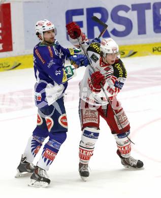 EBEL. Eishockey Bundesliga. EC VSV gegen KAC. Mario Altmann, (VSV), Luke Pither  (KAC). Villach, am 18.1.2015.
Foto: Kuess 


---
pressefotos, pressefotografie, kuess, qs, qspictures, sport, bild, bilder, bilddatenbank