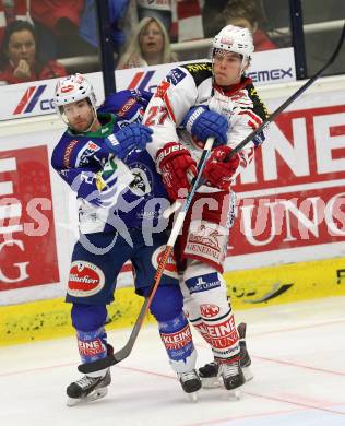 EBEL. Eishockey Bundesliga. EC VSV gegen KAC.  Darren Haydar,  (VSV), Thomas HUndertpfund (KAC). Villach, am 18.1.2015.
Foto: Kuess 


---
pressefotos, pressefotografie, kuess, qs, qspictures, sport, bild, bilder, bilddatenbank