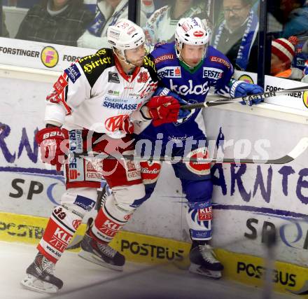 EBEL. Eishockey Bundesliga. EC VSV gegen KAC. Gerhard Unterluggauer,  (VSV), Jean Francois Jacques (KAC). Villach, am 18.1.2015.
Foto: Kuess 


---
pressefotos, pressefotografie, kuess, qs, qspictures, sport, bild, bilder, bilddatenbank