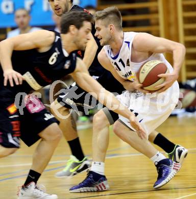 Basketball 2.Bundesliga 2014/15 Grunddurchgang 15.Runde. Radenthein Garnets gegen Mattersburg Rocks. Ziga Erculj, (Radenthein), David Jandl  (Mattersburg). Radenthein, 18.1.2015.
Foto: Kuess
---
pressefotos, pressefotografie, kuess, qs, qspictures, sport, bild, bilder, bilddatenbank