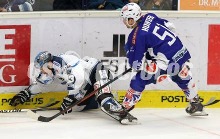 EBEL. Eishockey Bundesliga. EC VSV gegen EHC Liwest Black Wings Linz.  Eric HUnter,  (VSV), Fabio Hofer (Linz). Villach, am 22.1.2015.
Foto: Kuess 


---
pressefotos, pressefotografie, kuess, qs, qspictures, sport, bild, bilder, bilddatenbank