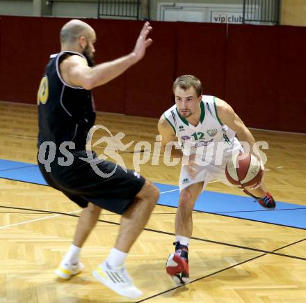 Basketball 2.Bundesliga 2014/15 Grunddurchgang 16.Runde. KOS Celovec gegen Woerthersee Piraten. Fabian Gallob,  (KOS Celovec), Joachim Buggelsheim (Woerthersee Piraten). Klagenfurt, 24.1.2015.
Foto: Kuess
---
pressefotos, pressefotografie, kuess, qs, qspictures, sport, bild, bilder, bilddatenbank