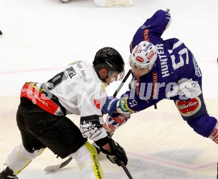 EBEL. Eishockey Bundesliga. EC VSV gegen Dornbirner Eishockey Club.  Eric Hunter, (VSV),  James Arniel  (Dornbirn). Villach, am 25.1.2015.
Foto: Kuess 


---
pressefotos, pressefotografie, kuess, qs, qspictures, sport, bild, bilder, bilddatenbank