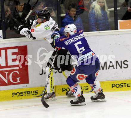 EBEL. Eishockey Bundesliga. EC VSV gegen Dornbirner Eishockey Club.  Gerhard Unterluggauer,  (VSV),  Ryan Kinasewich (Dornbirn). Villach, am 25.1.2015.
Foto: Kuess 


---
pressefotos, pressefotografie, kuess, qs, qspictures, sport, bild, bilder, bilddatenbank