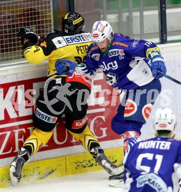 EBEL. Eishockey Bundesliga. EC VSV gegen UPC Vienna Capitals. Daniel Nageler, (VSV),  Patrick Peter (Caps). Villach, am 10.2.2015.
Foto: Kuess 


---
pressefotos, pressefotografie, kuess, qs, qspictures, sport, bild, bilder, bilddatenbank