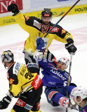 EBEL. Eishockey Bundesliga. EC VSV gegen UPC Vienna Capitals. Eric Hunter,  (VSV), Philippe Lakos (Caps). Villach, am 10.2.2015.
Foto: Kuess 


---
pressefotos, pressefotografie, kuess, qs, qspictures, sport, bild, bilder, bilddatenbank