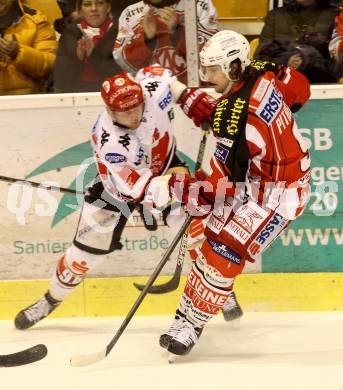 EBEL. Eishockey Bundesliga. KAC gegen HC TWK Innsbruck. Luke Pither,  (KAC), Huber Mario (Innsbruck). Klagenfurt, am 10.2.2015.
Foto: Kuess 

---
pressefotos, pressefotografie, kuess, qs, qspictures, sport, bild, bilder, bilddatenbank