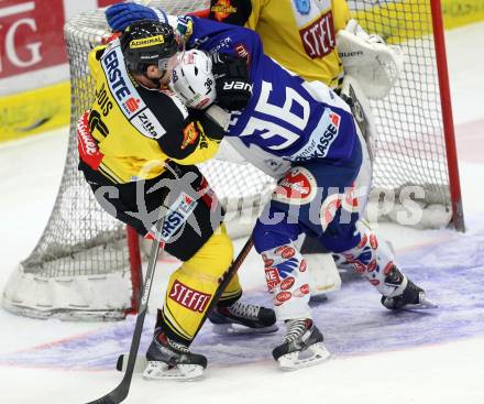 EBEL. Eishockey Bundesliga. EC VSV gegen UPC Vienna Capitals.  Marco Pewal, (VSV), Danny Bois  (Caps). Villach, am 10.2.2015.
Foto: Kuess 


---
pressefotos, pressefotografie, kuess, qs, qspictures, sport, bild, bilder, bilddatenbank