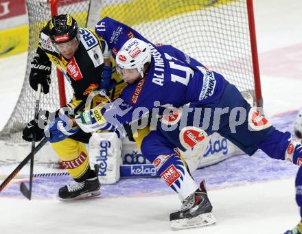 EBEL. Eishockey Bundesliga. EC VSV gegen UPC Vienna Capitals. Mario Altmann,  (VSV), Kenny Magowan  (Caps). Villach, am 10.2.2015.
Foto: Kuess 


---
pressefotos, pressefotografie, kuess, qs, qspictures, sport, bild, bilder, bilddatenbank