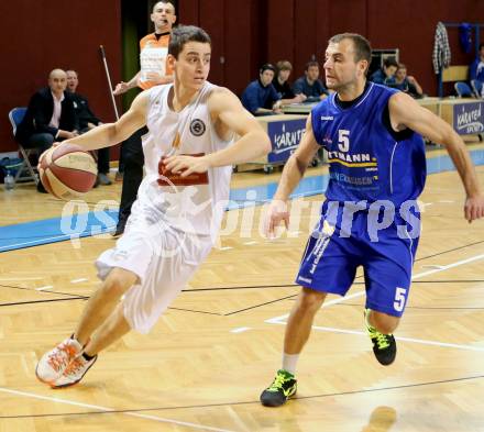 Basketball 2.Bundesliga 2014/15 Grunddurchgang 19.Runde. Woerthersee Piraten gegen Radenthein Garnets. Martin Breithuber,  (Piraten), Patrick Biedermann (Radenthein). Klagenfurt, 14.2.2015.
Foto: Kuess
---
pressefotos, pressefotografie, kuess, qs, qspictures, sport, bild, bilder, bilddatenbank