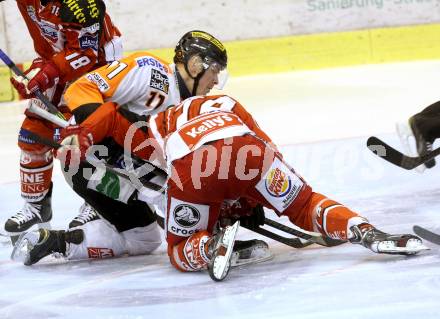 EBEL. Eishockey Bundesliga. KAC gegen Moser Medical Graz 99ers.  Jamie Lundmark,  (KAC),  Anders Bastiansen (Graz). Klagenfurt, am 15.2.2015.
Foto: Kuess 

---
pressefotos, pressefotografie, kuess, qs, qspictures, sport, bild, bilder, bilddatenbank