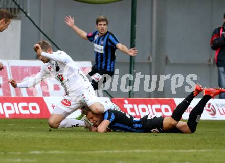 Fussball Bundesliga. RZ Pellets WAC gegen FK Austria Wien. Manuel Weber, (WAC), Alexander Gruenwald  (Wien). Klagenfiurt, am 15.2.2015.
Foto: Kuess

---
pressefotos, pressefotografie, kuess, qs, qspictures, sport, bild, bilder, bilddatenbank