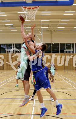 Basketball 2.Bundesliga 2014/15 Grunddurchgang 20.Runde. Raiders Villach gegen BBU Salzburg. Ppovilas Gaidys, (Villach), Fabio Thaler (Salzburg). Villach, am 21.2.1015.
Foto: Kuess
---
pressefotos, pressefotografie, kuess, qs, qspictures, sport, bild, bilder, bilddatenbank