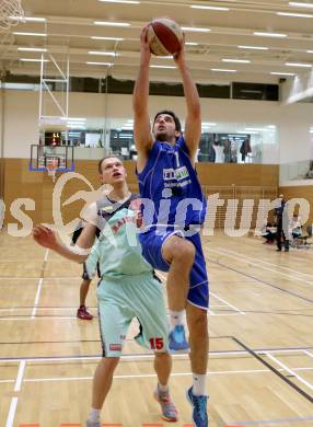 Basketball 2.Bundesliga 2014/15 Grunddurchgang 20.Runde. Raiders Villach gegen BBU Salzburg. Povilas Gaidys,  (Villach), Milan Kezic (Salzburg). Villach, am 21.2.1015.
Foto: Kuess
---
pressefotos, pressefotografie, kuess, qs, qspictures, sport, bild, bilder, bilddatenbank