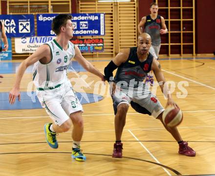 Basketball 2.Bundesliga 2014/15 Grunddurchgang 21.Runde. KOS Celovec gegen Raiders Villach. Andi Smrtnik,  (KOS), Thomas Kelley (Villach). Klagenfurt, am 27.2.1015.
Foto: Kuess
---
pressefotos, pressefotografie, kuess, qs, qspictures, sport, bild, bilder, bilddatenbank