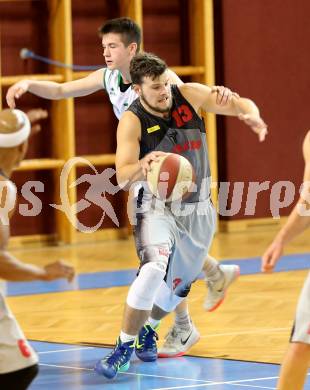 Basketball 2.Bundesliga 2014/15 Grunddurchgang 21.Runde. KOS Celovec gegen Raiders Villach. Peter Papic,  (KOS), Andreas Napokoj (Villach). Klagenfurt, am 27.2.1015.
Foto: Kuess
---
pressefotos, pressefotografie, kuess, qs, qspictures, sport, bild, bilder, bilddatenbank