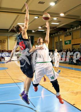 Basketball 2.Bundesliga 2014/15 Grunddurchgang 21.Runde. KOS Celovec gegen Raiders Villach. Jasmin Hercegovas, (KOS), Povalis Gaidys (Villach). Klagenfurt, am 27.2.1015.
Foto: Kuess
---
pressefotos, pressefotografie, kuess, qs, qspictures, sport, bild, bilder, bilddatenbank