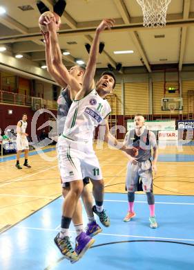 Basketball 2.Bundesliga 2014/15 Grunddurchgang 21.Runde. KOS Celovec gegen Raiders Villach. Toman Feinig,   (KOS), Povilas Gaidys (Villach). Klagenfurt, am 27.2.1015.
Foto: Kuess
---
pressefotos, pressefotografie, kuess, qs, qspictures, sport, bild, bilder, bilddatenbank