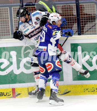 EBEL. Eishockey Bundesliga. EC VSV gegen SAPA Fehervar AV19.  Marius Goehringer, (VSV),  Arnold Varga (Alba Volan). Villach, am 3.3.2015.
Foto: Kuess 


---
pressefotos, pressefotografie, kuess, qs, qspictures, sport, bild, bilder, bilddatenbank