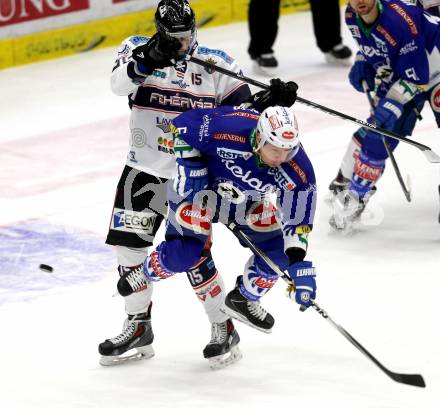 EBEL. Eishockey Bundesliga. EC VSV gegen SAPA Fehervar AV19. Gerhard Unterluggauer,  (VSV),Arnold Varga (Alba Volan). Villach, am 3.3.2015.
Foto: Kuess 


---
pressefotos, pressefotografie, kuess, qs, qspictures, sport, bild, bilder, bilddatenbank