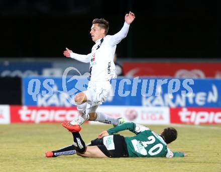 Fussball Bundesliga. RZ Pellets WAC gegen SV Josko Ried. Rene Seebacher,  (WAC), Dieter Elsneg (Ried). Wolfsberg, am 4.3.2015.
Foto: Kuess

---
pressefotos, pressefotografie, kuess, qs, qspictures, sport, bild, bilder, bilddatenbank