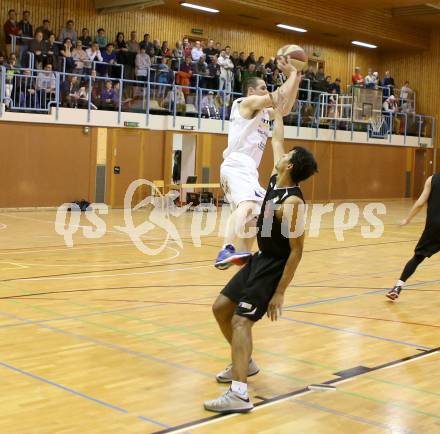 Basketball 2.Bundesliga 2014/15 Grunddurchgang 22.Runde. Radenthein Garnets gegen Mistelbach Mustangs. Uros Ninic,  (Radenthein), Daniel Gajdosik (Mistelbach). Radenthein, am 7.3.1015.
Foto: Kuess
---
pressefotos, pressefotografie, kuess, qs, qspictures, sport, bild, bilder, bilddatenbank