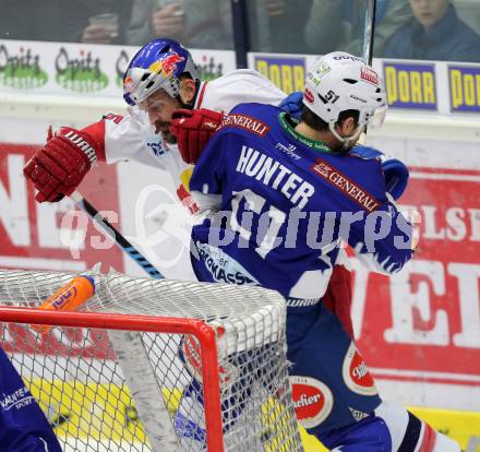 EBEL. Eishockey Bundesliga. EC VSV gegen EC Red Bull Salzburg. Eric Hunter,  (VSV), Manuel Latusa (Salzburg). Villach, am 13.3.2015.
Foto: Kuess 


---
pressefotos, pressefotografie, kuess, qs, qspictures, sport, bild, bilder, bilddatenbank