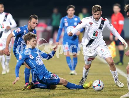 Fussball Bundesliga. RZ Pellets WAC gegen SC Wiener Neustadt. Manuel Weber (WAC), Christoph Freitag (Wiener Neustadt). Wolfsberg, am 14.3.2015.
Foto: Kuess

---
pressefotos, pressefotografie, kuess, qs, qspictures, sport, bild, bilder, bilddatenbank