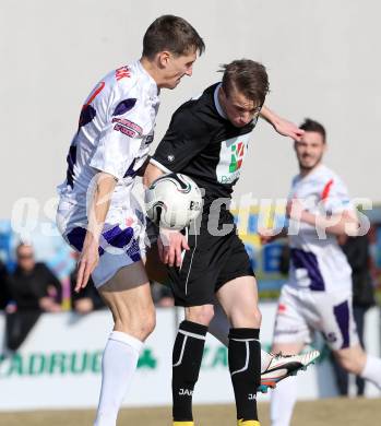 Fussball Regionalliga. SAK gegen RZ Pellets WAC Amateure. Tilen Kompan, (SAK), Alexander Hofer (WAC). Klagenfurt, am 14.3.2015.
Foto: Kuess
---
pressefotos, pressefotografie, kuess, qs, qspictures, sport, bild, bilder, bilddatenbank