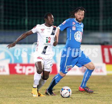 Fussball Bundesliga. RZ Pellets WAC gegen SC Wiener Neustadt.  Oussale Ouebalena Herve Marouf (WAC), Matthias Sereinig (Wiener Neustadt). Wolfsberg, am 14.3.2015.
Foto: Kuess

---
pressefotos, pressefotografie, kuess, qs, qspictures, sport, bild, bilder, bilddatenbank