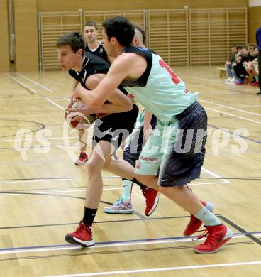 Basketball 2.Bundesliga 2014/15 Play off. Viertelfinale. Raiders Villach gegen Mistelbach Mustangs. Erik Rhinehart, (Villach), Jakob Deimel  (Mistelbach). Villach, am 21.3.2015.
Foto: Kuess
---
pressefotos, pressefotografie, kuess, qs, qspictures, sport, bild, bilder, bilddatenbank