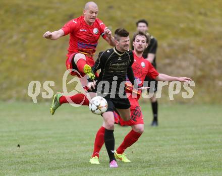 Fussball Kaerntner Liga. Koettmannsdorf gegen Lendorf. Daniel Globotschnig,  (Koettmannsdorf). Christian Huber (Lendorf). Koettmannsdorf, am 29.3.2015.
Foto: Kuess
---
pressefotos, pressefotografie, kuess, qs, qspictures, sport, bild, bilder, bilddatenbank