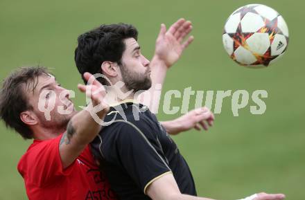 Fussball Kaerntner Liga. Koettmannsdorf gegen Lendorf. Stephan Buergler, (Koettmannsdorf). Andreas Marco Allmayer  (Lendorf). Koettmannsdorf, am 29.3.2015.
Foto: Kuess
---
pressefotos, pressefotografie, kuess, qs, qspictures, sport, bild, bilder, bilddatenbank