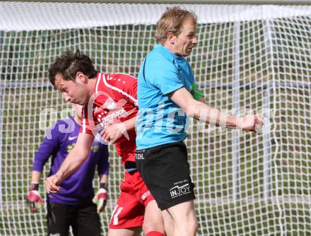 Fussball Unterliga Ost. Ludmannsdorf gegen SG Magdalensberg/Eberndorfer AC. Michael Sablatnik,  (Ludmannsdorf), Roland Zunk (Magdalensberg). Ludmannsdorf, am 5.4.2015.
Foto: Kuess
---
pressefotos, pressefotografie, kuess, qs, qspictures, sport, bild, bilder, bilddatenbank