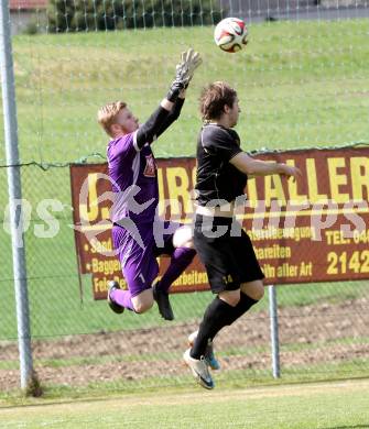 Fussball. Kaerntner Liga. Koettmannsdorf gegen Maria Saal. Christian Schimmel (Koettmannsdorf), Adrian Warmuth (Maria Saal). Koettmannsdorf, 12.4.2015.
Foto: Kuess
---
pressefotos, pressefotografie, kuess, qs, qspictures, sport, bild, bilder, bilddatenbank