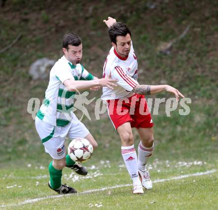 Fussball 1. KLasse A Untere Play Off. Nikolsdorf/Oberdrauburg gegen Obermillstatt. Gernot Peter Niedertscheider,  (Nikolsdorf), Martin Huber (Obermillstatt). Nikolsdorf,am 11.4.2015.
Foto: Kuess
---
pressefotos, pressefotografie, kuess, qs, qspictures, sport, bild, bilder, bilddatenbank