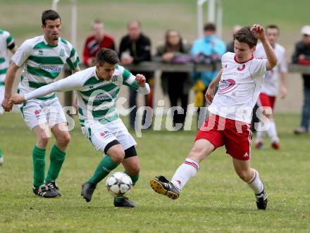 Fussball 1. KLasse A Untere Play Off. Nikolsdorf/Oberdrauburg gegen Obermillstatt. Mathias Winkler,  (Nikolsdorf), Stefan Brugger (Obermillstatt). Nikolsdorf,am 11.4.2015.
Foto: Kuess
---
pressefotos, pressefotografie, kuess, qs, qspictures, sport, bild, bilder, bilddatenbank