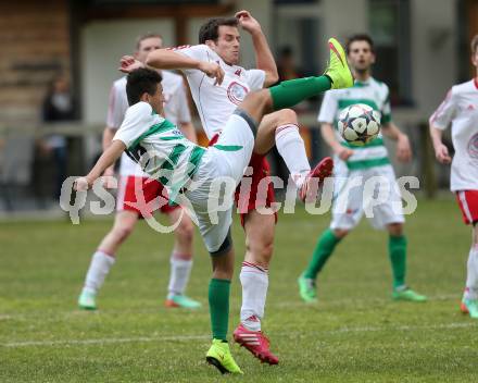 Fussball 1. KLasse A Untere Play Off. Nikolsdorf/Oberdrauburg gegen Obermillstatt.  Martin Trutschnig, (Nikolsdorf), Maximilian Mayr (Obermillstatt). Nikolsdorf,am 11.4.2015.
Foto: Kuess
---
pressefotos, pressefotografie, kuess, qs, qspictures, sport, bild, bilder, bilddatenbank