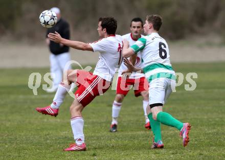 Fussball 1. KLasse A Untere Play Off. Nikolsdorf/Oberdrauburg gegen Obermillstatt. Martin Trutschnig,  (Nikolsdorf), Stephan Gernot Goetz (Obermillstatt). Nikolsdorf,am 11.4.2015.
Foto: Kuess
---
pressefotos, pressefotografie, kuess, qs, qspictures, sport, bild, bilder, bilddatenbank