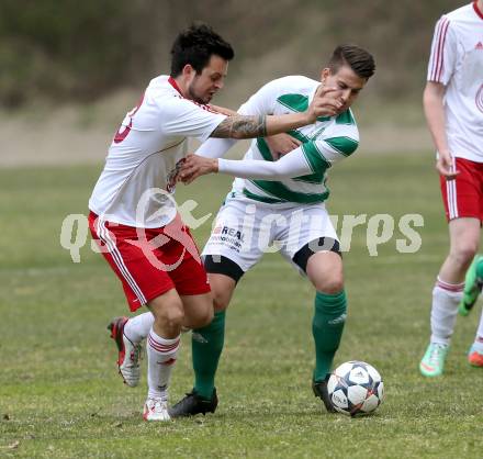 Fussball 1. KLasse A Untere Play Off. Nikolsdorf/Oberdrauburg gegen Obermillstatt. Gernot Peter Niedertscheider, (Nikolsdorf),  Stefan Brugger (Obermillstatt). Nikolsdorf,am 11.4.2015.
Foto: Kuess
---
pressefotos, pressefotografie, kuess, qs, qspictures, sport, bild, bilder, bilddatenbank