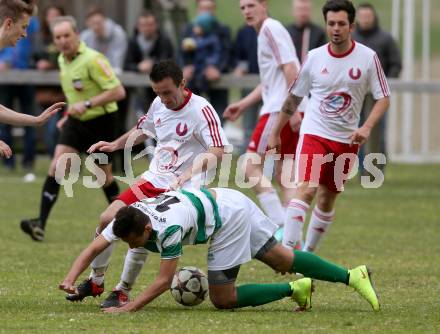 Fussball 1. KLasse A Untere Play Off. Nikolsdorf/Oberdrauburg gegen Obermillstatt. Amer Jukan,  (Nikolsdorf), Maximilian Mayr (Obermillstatt). Nikolsdorf,am 11.4.2015.
Foto: Kuess
---
pressefotos, pressefotografie, kuess, qs, qspictures, sport, bild, bilder, bilddatenbank