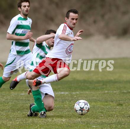 Fussball 1. KLasse A Untere Play Off. Nikolsdorf/Oberdrauburg gegen Obermillstatt. Amer Jukan,  (Nikolsdorf), Martin Huber (Obermillstatt). Nikolsdorf,am 11.4.2015.
Foto: Kuess
---
pressefotos, pressefotografie, kuess, qs, qspictures, sport, bild, bilder, bilddatenbank