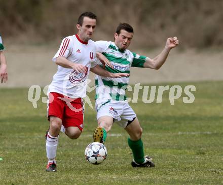 Fussball 1. KLasse A Untere Play Off. Nikolsdorf/Oberdrauburg gegen Obermillstatt. Amer Jukan, (Nikolsdorf), Martin Huber  (Obermillstatt). Nikolsdorf,am 11.4.2015.
Foto: Kuess
---
pressefotos, pressefotografie, kuess, qs, qspictures, sport, bild, bilder, bilddatenbank