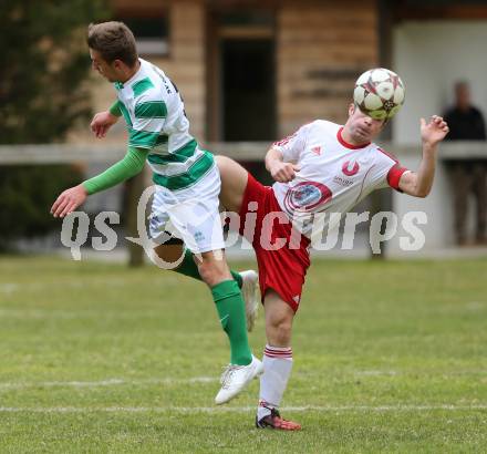 Fussball 1. KLasse A Untere Play Off. Nikolsdorf/Oberdrauburg gegen Obermillstatt. Patrick Mair,  (Nikolsdorf), Manuel Morgenstern (Obermillstatt). Nikolsdorf,am 11.4.2015.
Foto: Kuess
---
pressefotos, pressefotografie, kuess, qs, qspictures, sport, bild, bilder, bilddatenbank