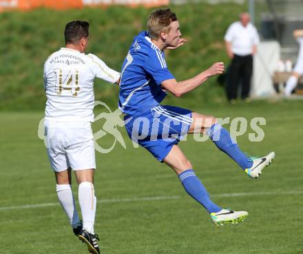 Fussball Unterliga Ost. SPG FC Poggersdorf gegen Ruden. Lucian Florin Orga,  (Poggersdorf), Tadej Slemenik (Ruden). Poggersdorf, am 19.4.2015.
Foto: Kuess
---
pressefotos, pressefotografie, kuess, qs, qspictures, sport, bild, bilder, bilddatenbank