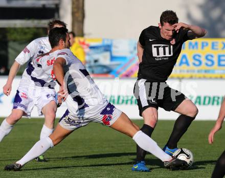 Fussball Regionalliga. SAK gegen St. Florian. Murat Veliu,  (SAK), Qerim Idrizaj (St. Florian). Klagenfurt, am 24.5.2015.
Foto: Kuess
---
pressefotos, pressefotografie, kuess, qs, qspictures, sport, bild, bilder, bilddatenbank