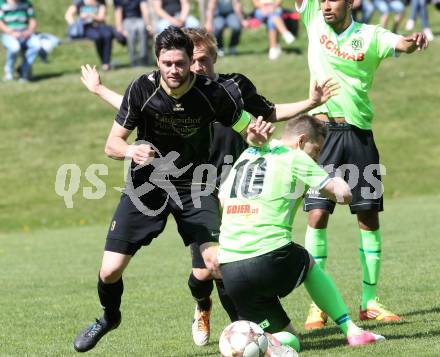 Fussball. Kaerntner Liga. Koettmannsdorf gegen Kuehnsdorf. Stephan Buergler (Koettmannsdorf), Robert Matic (Kuehnsdorf). Koettmannsdorf, 26.4.2015.
Foto: Kuess
---
pressefotos, pressefotografie, kuess, qs, qspictures, sport, bild, bilder, bilddatenbank