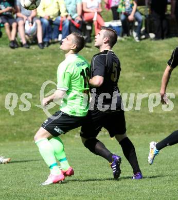 Fussball. Kaerntner Liga. Koettmannsdorf gegen Kuehnsdorf. Christoph Hubert Habith (Koettmannsdorf), Robert Matic (Kuehnsdorf). Koettmannsdorf, 26.4.2015.
Foto: Kuess
---
pressefotos, pressefotografie, kuess, qs, qspictures, sport, bild, bilder, bilddatenbank