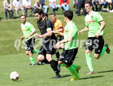 Fussball. Kaerntner Liga. Koettmannsdorf gegen Kuehnsdorf. Stephan Buergler (Koettmannsdorf), Gustavo Modolo Nogueira, Zoran Vukovic (Kuehnsdorf). Koettmannsdorf, 26.4.2015.
Foto: Kuess
---
pressefotos, pressefotografie, kuess, qs, qspictures, sport, bild, bilder, bilddatenbank