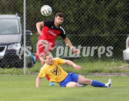 Fussball Unterliga Ost. Woelfnitz gegen St. Michael/Bleiburg. Lukas Steiner, (Woelfnitz), Georg Woschitz  (St. Michael). Woelfnitz, am 2.5.2015.
Foto: Kuess
---
pressefotos, pressefotografie, kuess, qs, qspictures, sport, bild, bilder, bilddatenbank